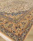 Louie Traditional Ivory Hand Knotted Wool & Silk Rug, showcasing its intricate traditional design with ivory hues and luxurious texture.