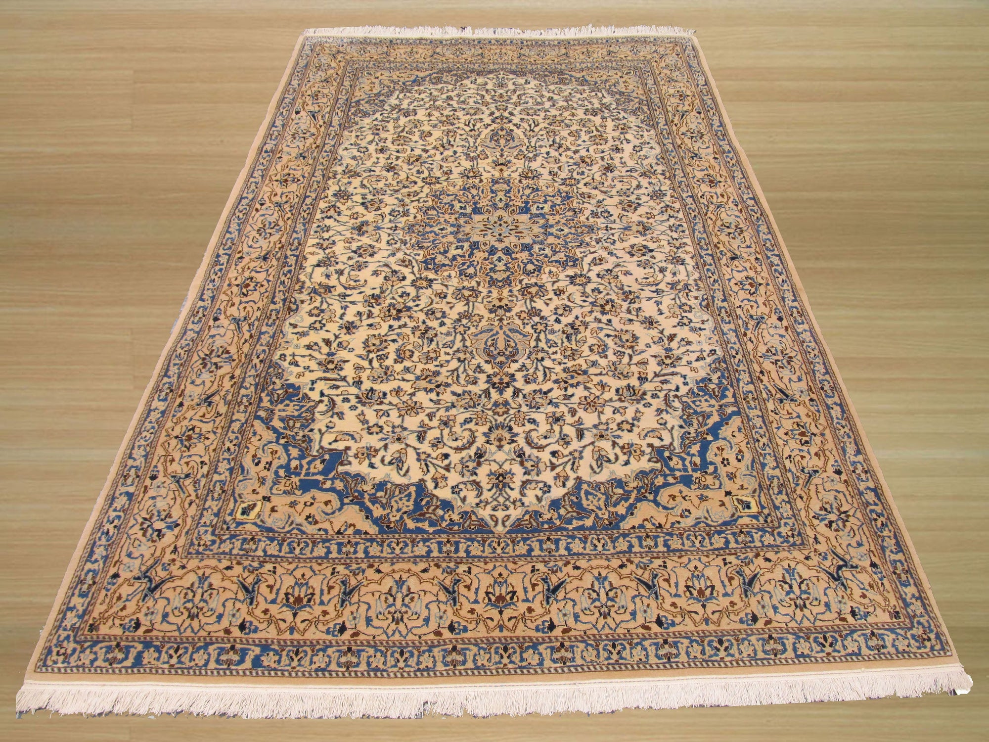 Louie Traditional Ivory Hand Knotted Wool & Silk Rug, intricately patterned in muted ivory tones, lending timeless elegance to a warmly lit room setting.