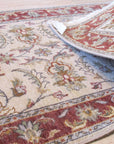 Beautiful Maya Ivory Hand Knotted Wool Rug, showcasing its intricate hand-knotted construction and soft ivory tones, displayed in a living room setting.