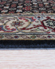 Elena Versatile Brown Hand Knotted Wool Rug, a versatile floor covering with a warm brown hue and hand-knotted construction, displayed in a well-lit interior setting.