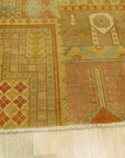 Mira Agra Multicolor Hand Knotted Wool Rug, a vibrant explosion of colors in a hand-knotted wool construction, displayed on a polished hardwood floor with subtle lighting highlighting its texture.