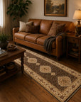 Ophelia Amara Brown Hand Knotted Wool Rug styled in a warm traditional living room - area rug lifestyle photo