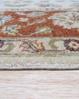 Exquisite Agra Multicolor Hand Knotted Wool Rug displayed in a bright living room, its intricate patterns and vibrant hues anchoring the space.
