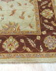 Alluring Artisan Multicolor Hand Knotted Wool Rug, vibrant hues dance across hand-knotted wool, creating an inviting warmth in this interior setting.