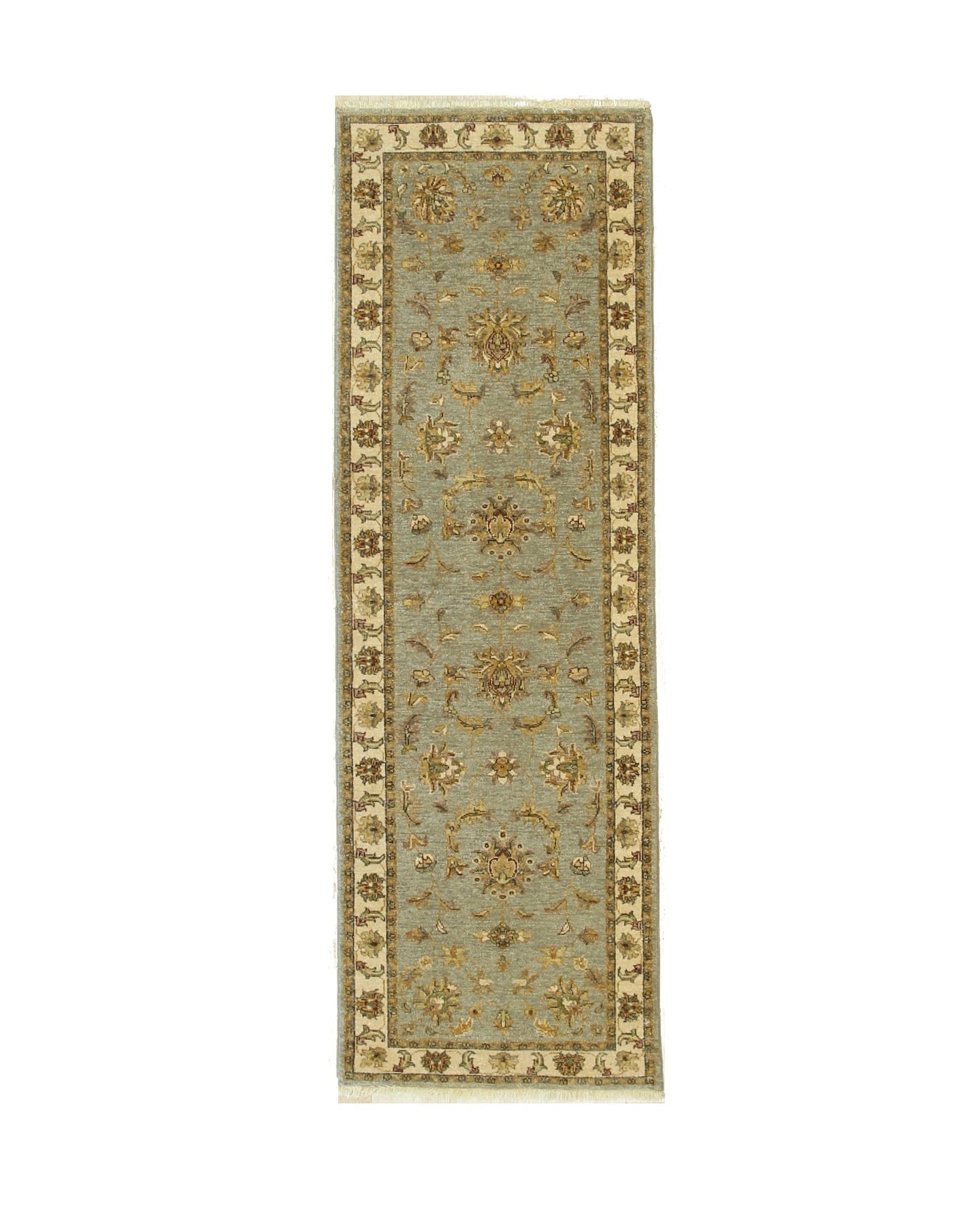 Zinnia Agra Green Hand Knotted Wool Rug, seen in a living room setting, features a lush green field and intricate, traditional Agra-style floral motifs. Hand-knotted wool construction offers luxurious texture and enduring quality.