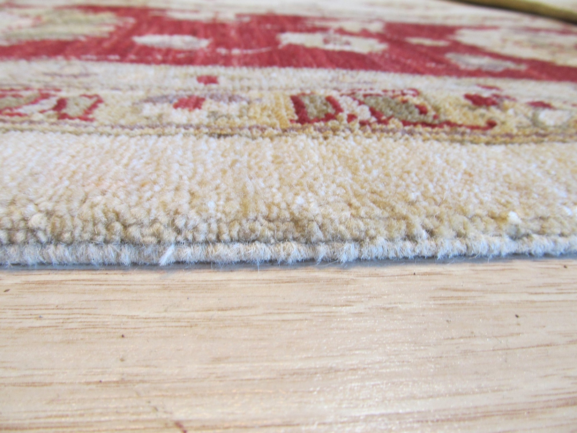 Para Peshawar Multicolor Hand Knotted Wool Rug, showcasing vibrant hues and intricate patterns across its hand-knotted wool surface, presented in a detailed view highlighting its craftsmanship.