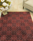 Sarrah Serene Multicolor Hand Knotted Wool Rug, vibrant wool rug displaying a modern geometric pattern with bold blocks of color, grounding a contemporary living space.