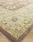 Unique Peshawar Beige Hand Knotted Wool Rug, its intricate patterns and warm beige tones complementing a modern living space with hardwood floors.