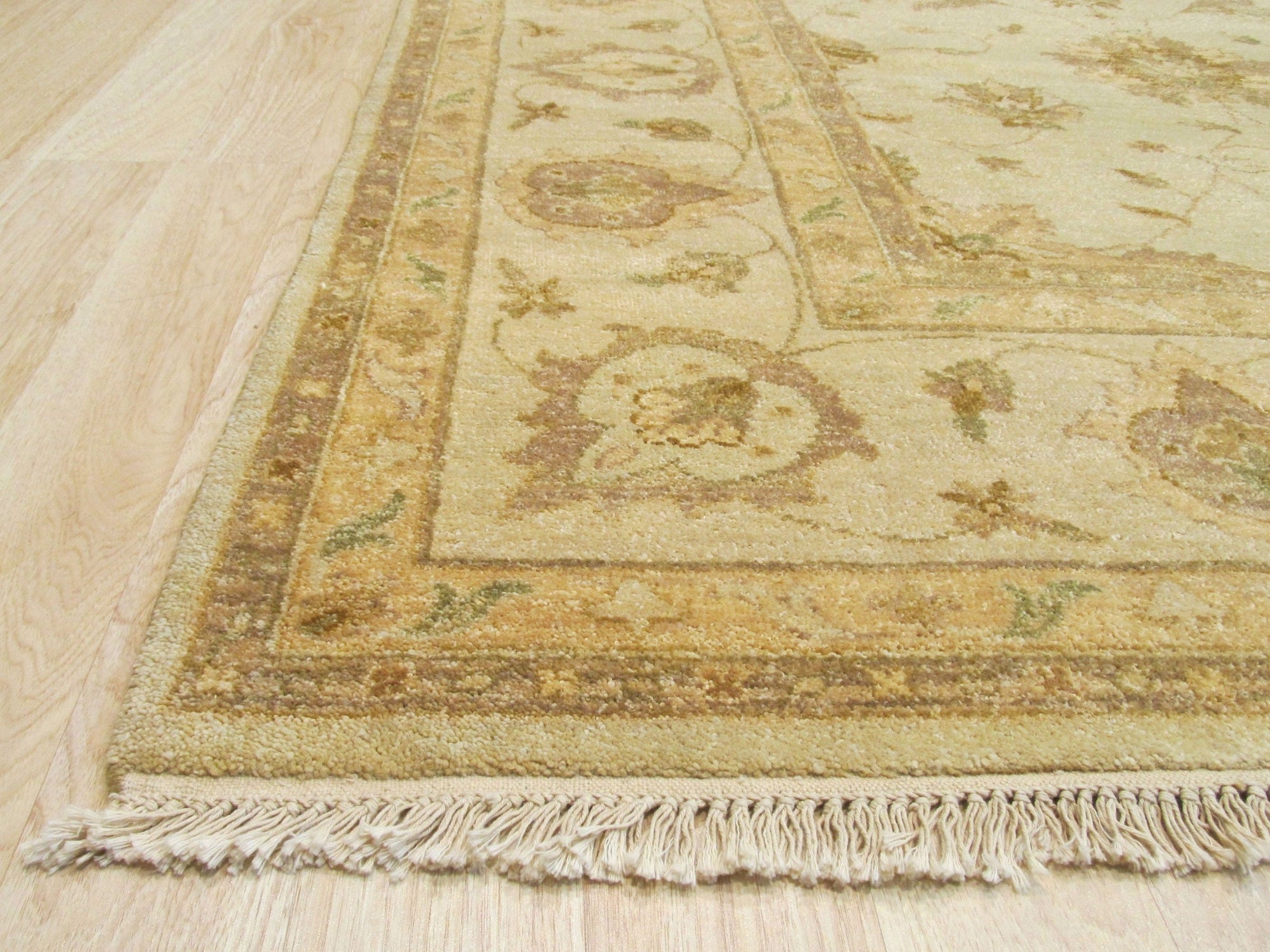 Iris Peshawar Multicolor Hand Knotted Wool Rug, vibrant bursts of color and intricate patterns blend in this wool rug, hand-knotted with classic Peshawar artistry.