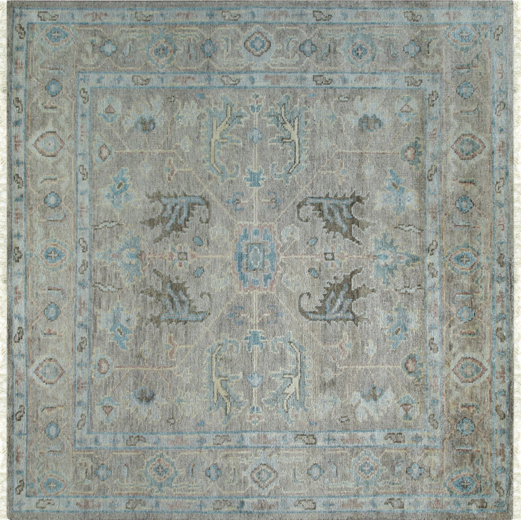 Captivating Traditional Beige Hand Knotted Wool Rug, features intricate patterns in warm beige tones, showcasing its hand-knotted construction.