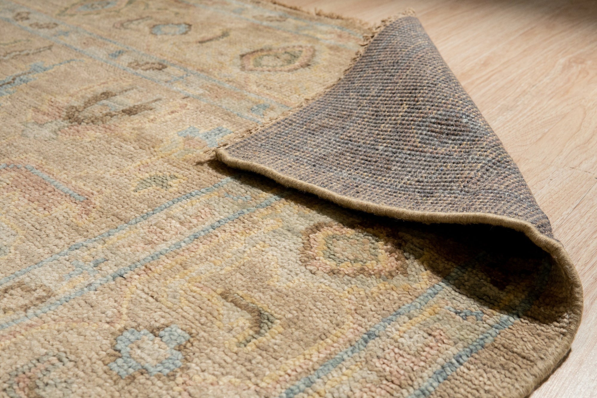 Captivating Traditional Beige Hand Knotted Wool Rug, soft beige wool rug featuring a classic, intricate pattern, adds warmth and timeless elegance to a living space.