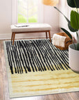 Mira Iris Yellow Hand Knotted Wool Rug, vibrant warmth radiating from its hand-knotted wool construction, infuses a room with sunshine yellow hues and an abstract design.