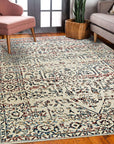 Lila Chic Multicolor Hand Knotted Wool & Viscose Rug, blending vibrant hues in a contemporary design, laying flat on a hardwood floor with hints of furniture suggesting a living room setting.