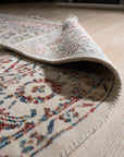 Lila Chic Multicolor Hand Knotted Wool & Viscose Rug, a vibrant burst of color and texture, lays elegantly in a modern living space, its intricate hand-knotted design adding warmth and sophistication.