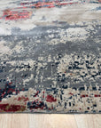 Versatile Enchanting Red Hand Knotted Wool & Viscose Rug, vibrant red with subtle sheen, lies flat on a light floor, its intricate hand-knotted design a statement piece.