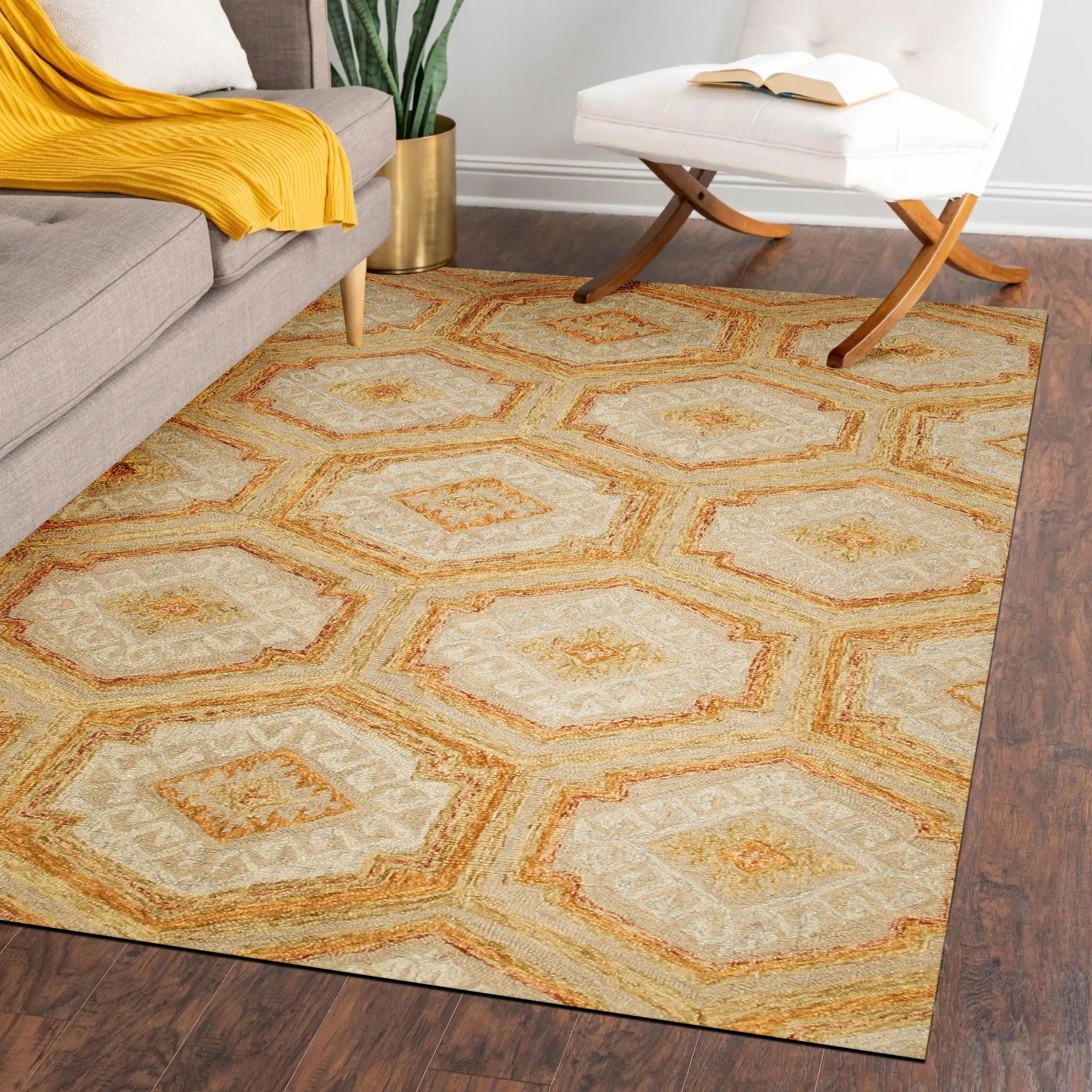Alluring Laine Gold Hand Tufted Wool Rug, a shimmering gold hand-tufted wool rug with subtle texture, laying flat to reveal its luxurious sheen and craftsmanship.
