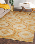 Alluring Laine Gold Hand Tufted Wool Rug, a shimmering gold hand-tufted wool rug with subtle texture, laying flat to reveal its luxurious sheen and craftsmanship.