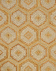 Isolated view of Alluring Laine Gold Hand Tufted Wool Rug, showcasing its subtle geometric pattern and luxurious texture.
