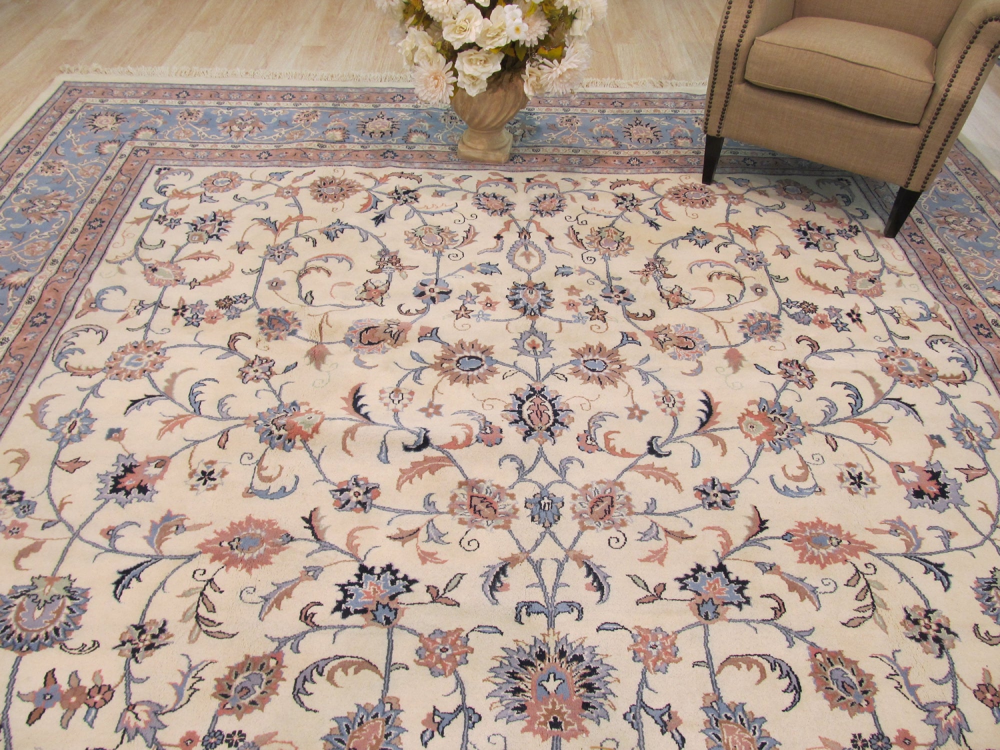 Radiant Oriental Multicolor Hand Knotted Wool Rug, vibrant jewel tones and intricate floral motifs dance across this hand-knotted wool rug, enriching the floor with warmth and texture.