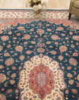Cozy Oriental Multicolor Hand Knotted Wool Rug displaying vibrant jewel tones and intricate floral patterns across a warm, inviting surface. Hand-knotted construction visible in the close-up, highlighting the rug's texture and craftsmanship.