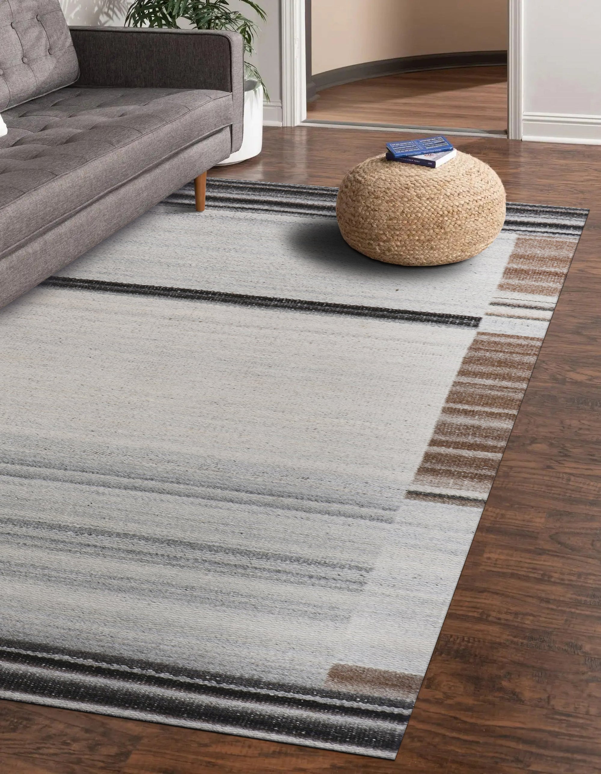 Classic Reversible Delicate Brown Flatweave Wool & Viscose Rug, its subtle brown tones and flatweave construction adding warmth and texture to a well-lit living space with a light wood floor.