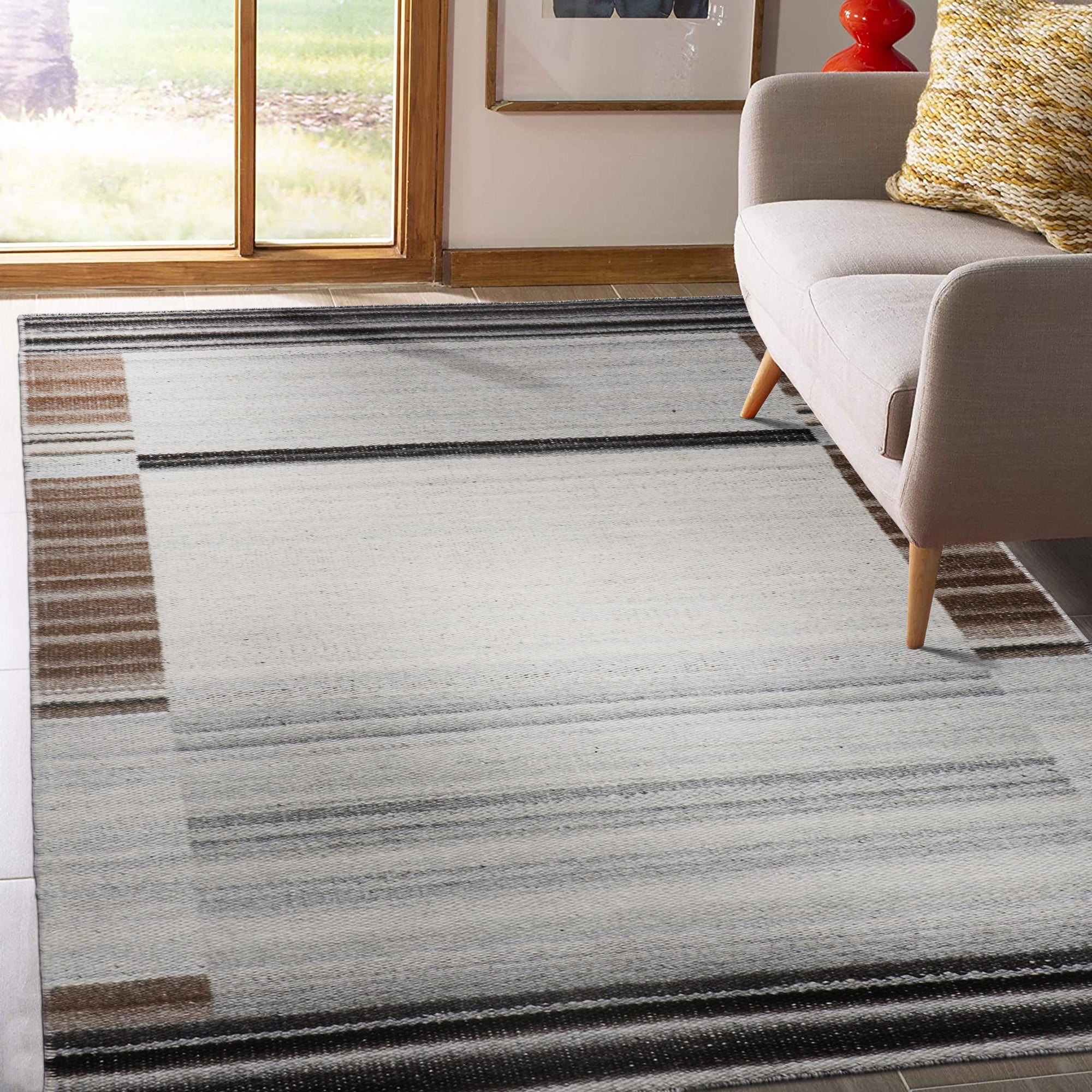 Classic Reversible Delicate Brown Flatweave Wool & Viscose Rug, showcasing its warm brown tones and subtle texture in a bright, sunlit living room setting.