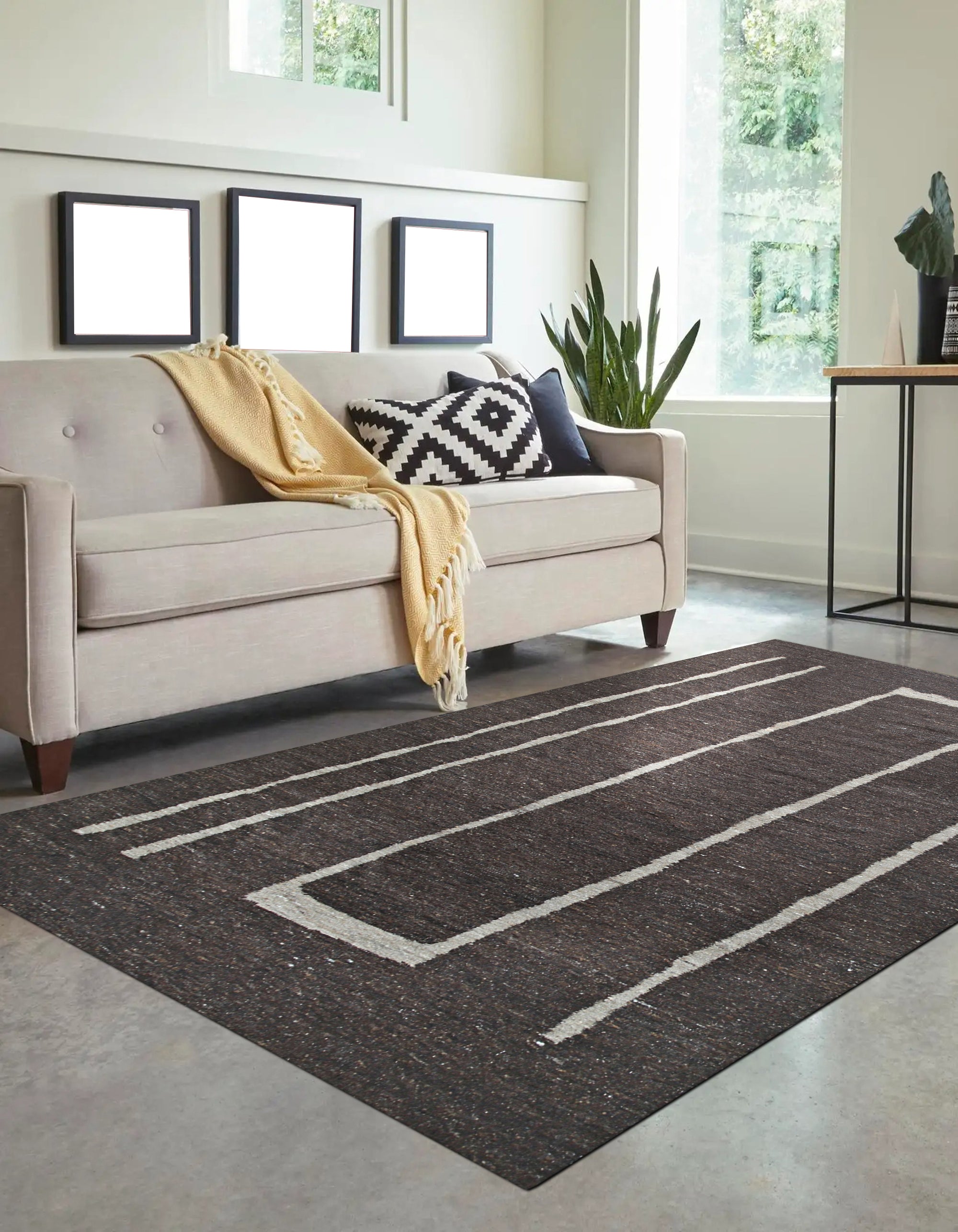 Talia Delicate Brown Flatweave Wool Rug, offering a detailed view of its woven texture and warm brown tones.