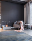 Freya Alluring Blue Handmade Rug, displaying intricate patterns and varying blue hues in a detailed floor covering.