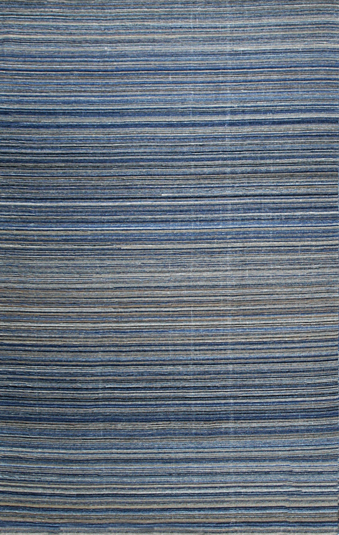 Isolated view of Freya Alluring Blue Handmade Rug, showcasing its mesmerizing abstract design with swirling blues and hints of cream.