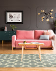 Selene Elena Gray Flatweave Wool Rug, a subtly textured gray wool rug with a minimalist design, laid out in a bright, modern living room setting.