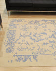 Stylish Graceful Blue Flatweave Wool Rug sits on a light hardwood floor, its cool blue tones and flatweave construction adding a touch of modern elegance to the room.
