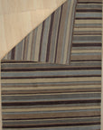 Trendy Classic Multicolor Handmade Wool Rug, vibrant blocks of color intersect in this handmade wool rug, seen in a bright, minimalist living room setting, adding warmth and texture to the modern space.