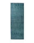 Beautiful Celia Green Hand Knotted Wool Rug, a richly textured, hand-knotted wool rug in shades of green, displayed in a modern living space.