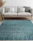Beautiful Celia Green Hand Knotted Wool Rug, showcasing a verdant palette and intricate hand-knotted texture within a bright, contemporary living space.