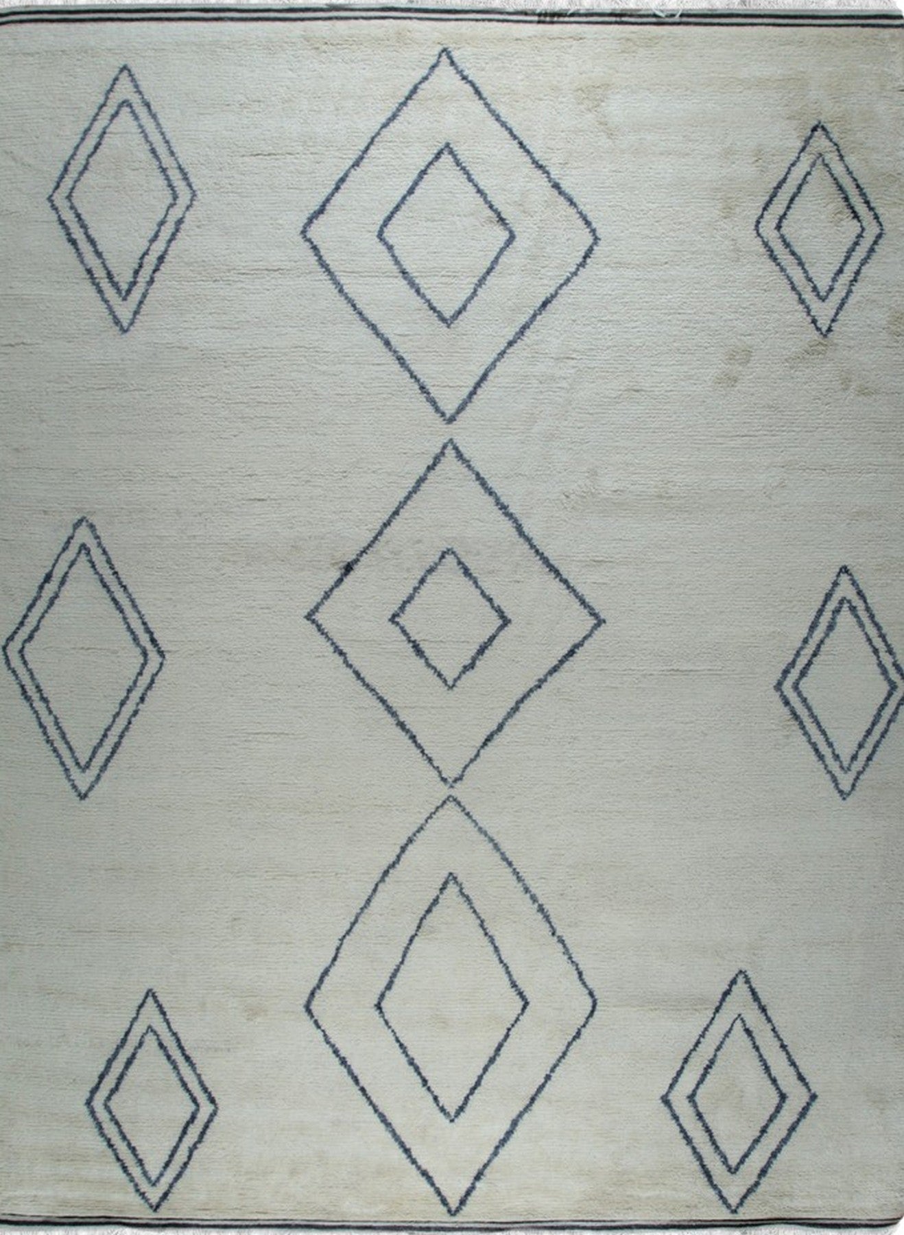 Isolated view of Selene Moroccan Ivory Hand Knotted Wool Rug, showcasing its intricate geometric pattern.