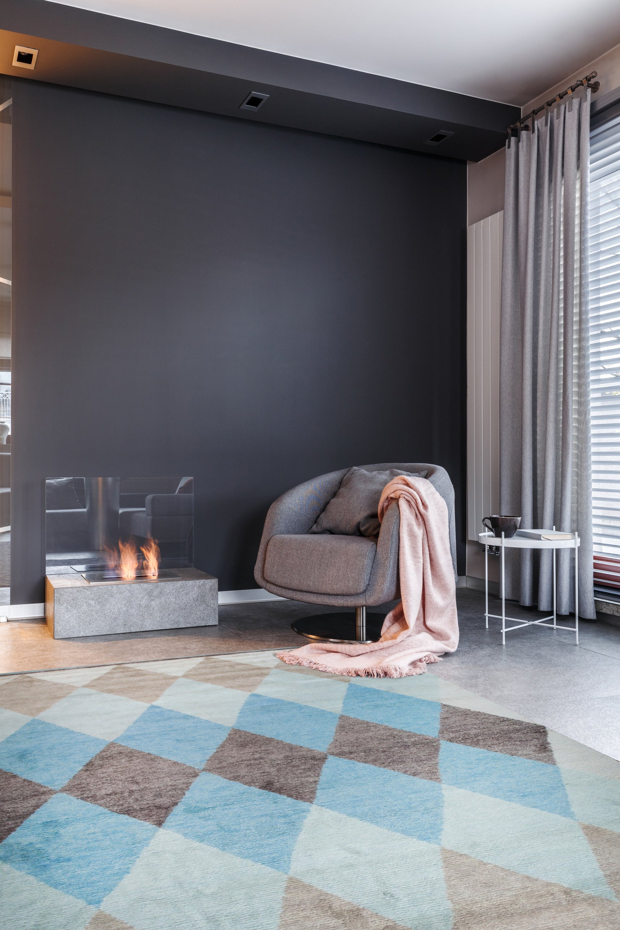 Comfortable Moroccan Multicolor Hand Knotted Wool Rug, blending vibrant hues and traditional patterns, sprawls across a warmly lit floor, its textured wool visible in soft detail.