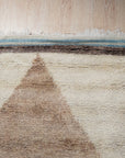 Comfortable Moroccan Multicolor Hand Knotted Wool Rug, a vibrant wool rug showcasing a lively mix of colors and a traditional Moroccan design, lies gracefully on a light wood floor.