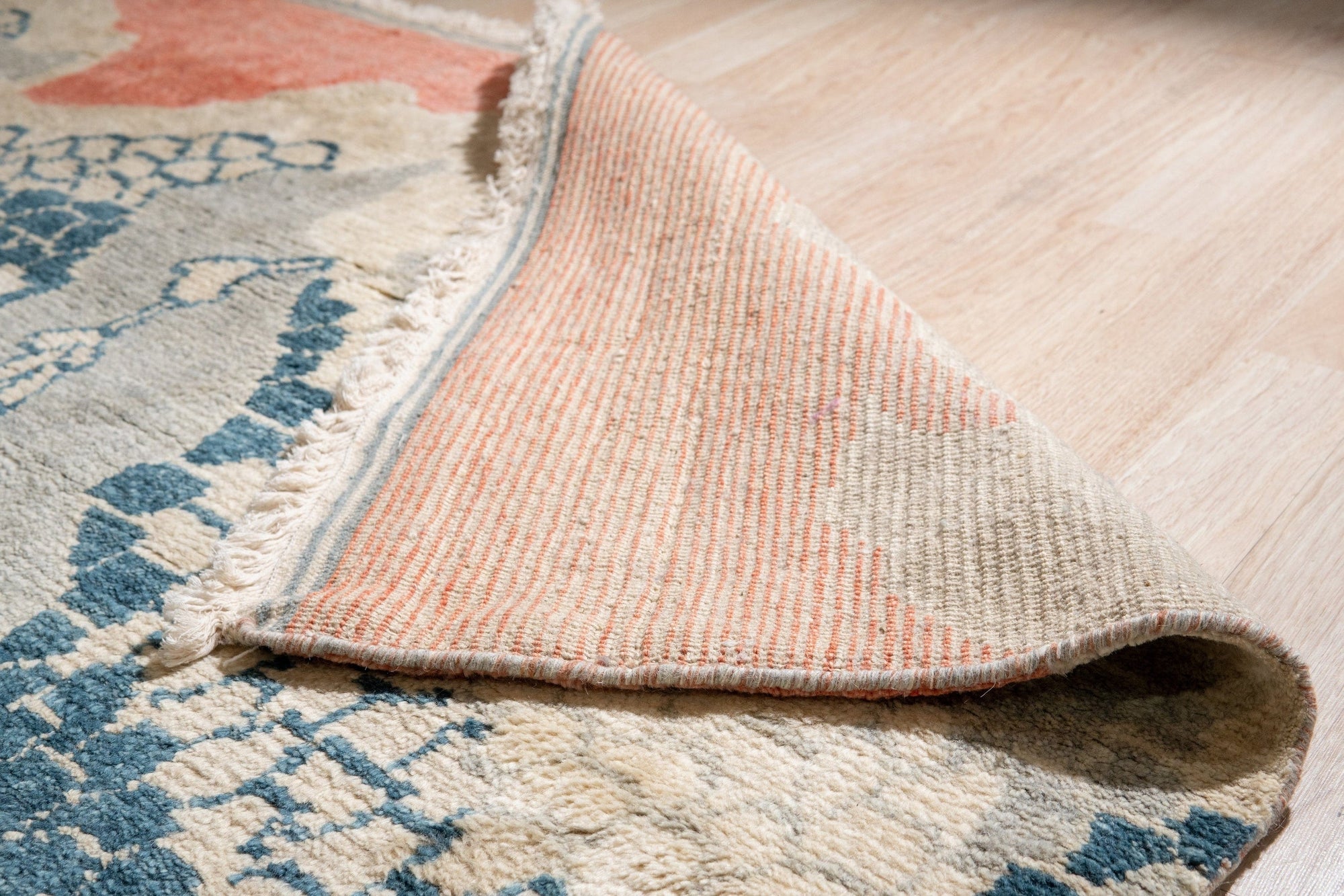 Comfortable Moroccan Multicolor Hand Knotted Wool Rug, vibrant wool artistry displaying geometric patterns in a warm, inviting setting.