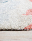 Comfortable Moroccan Multicolor Hand Knotted Wool Rug, a vibrant explosion of color and texture in a detailed close-up showcasing intricate hand-knotted wool craftsmanship.