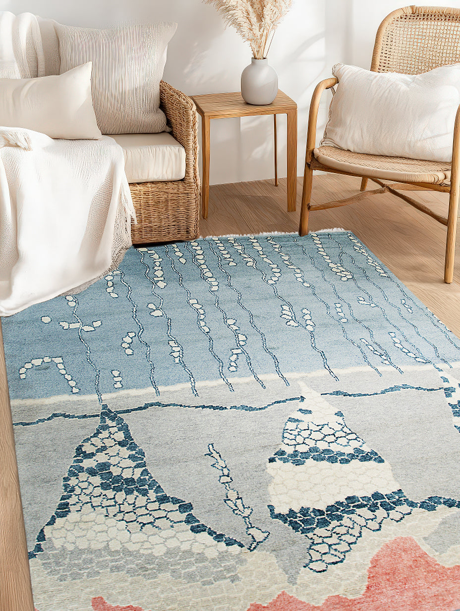 Comfortable Moroccan Multicolor Hand Knotted Wool Rug, vibrant and textured, anchors a minimalist living space with warm wood tones and natural light.