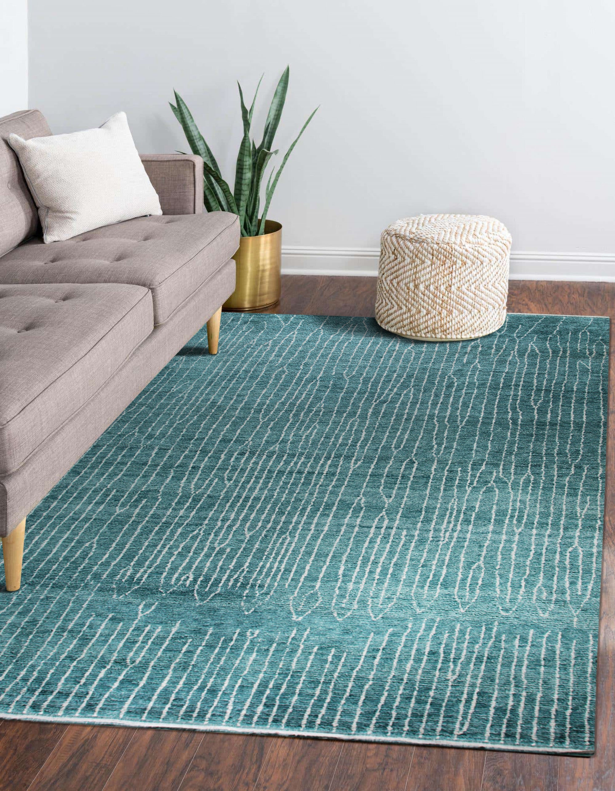 Lush Moroccan Green Hand Knotted Wool Rug, vibrant green hues and intricate Moroccan patterns enliven a light, airy room, handcrafted from soft wool.