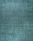 Isolated view of Lush Moroccan Green Hand Knotted Wool Rug, showcasing its intricate geometric design and lush pile.
