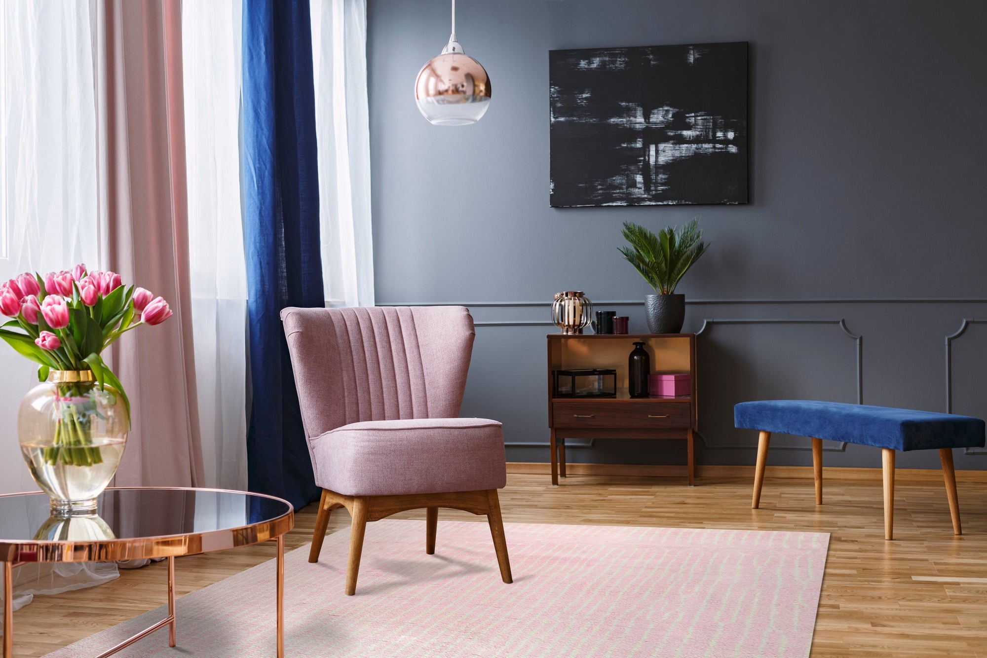 Delicate Moroccan Pink Hand Knotted Wool Rug, a pink wool rug with a traditional Moroccan design, seen in a bright interior.