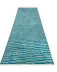 Exquisite Moroccan Handmade Wool Green Rug, showcasing dense, hand-knotted wool pile in varying shades of green and cream, with intricate geometric patterns characteristic of traditional Moroccan craftsmanship.