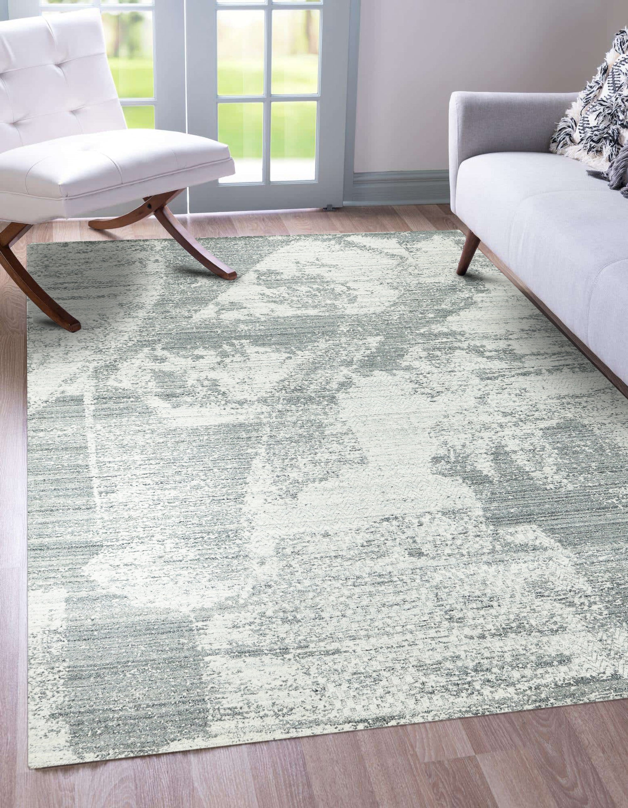 Versatile Freya Gray Handmade Wool Rug, its subtle gray tones lending warmth and texture to a living space.