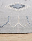 Rustic Penelope Silver Flatweave Rug, its subtle silver tones and flatweave construction blending seamlessly into a modern living space.