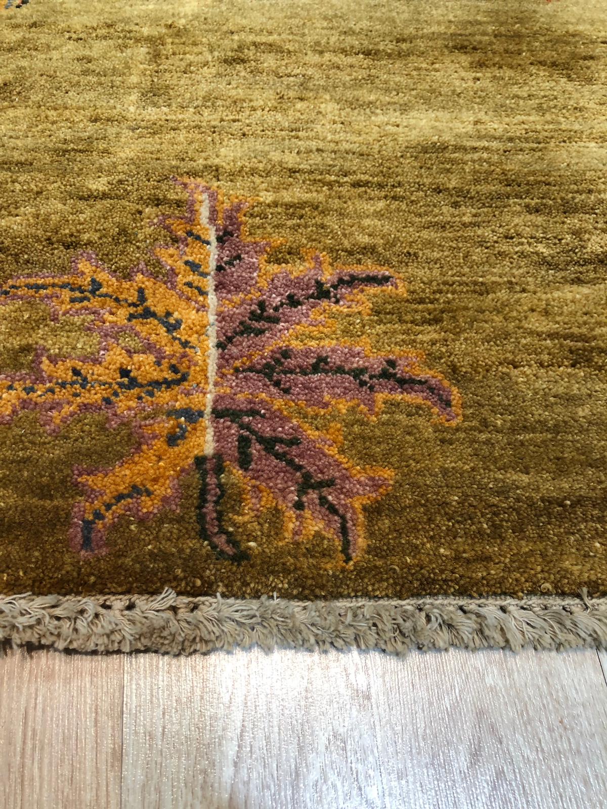 Isla Willow Brown Hand Knotted Wool Rug, featuring a subtle willow-brown palette and hand-knotted texture, anchors a bright living space with a natural, organic feel.