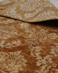 Rustic Bespoke Brown Hand Knotted Afghan Wool Rug, its warm brown hues and intricate hand-knotted patterns lending a touch of rustic elegance to a comfortably furnished living space.