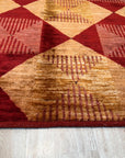 Opulent Classic Red Hand Knotted Afghan Wool Rug, rich red wool rug hand-knotted with intricate classic patterns, filling a sunlit room with warmth and traditional elegance.