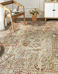 Sarrah Oushak Beige Hand Knotted Rug, a warm beige wool rug with a traditional Oushak pattern, displayed on a light hardwood floor, showcasing its intricate hand-knotted details.